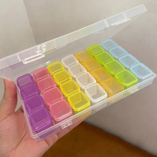 Boîte de rangement de bijoux en plastique à 28 grilles