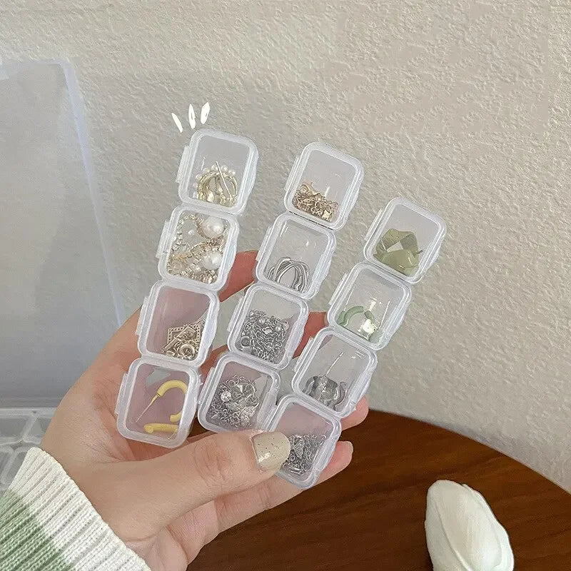 Boîte de rangement de bijoux en plastique à 28 grilles