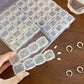 Boîte de rangement de bijoux en plastique à 28 grilles